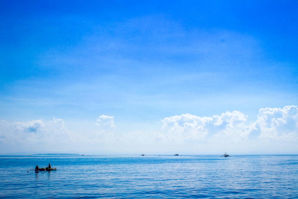 blue sky and white clouds over sea