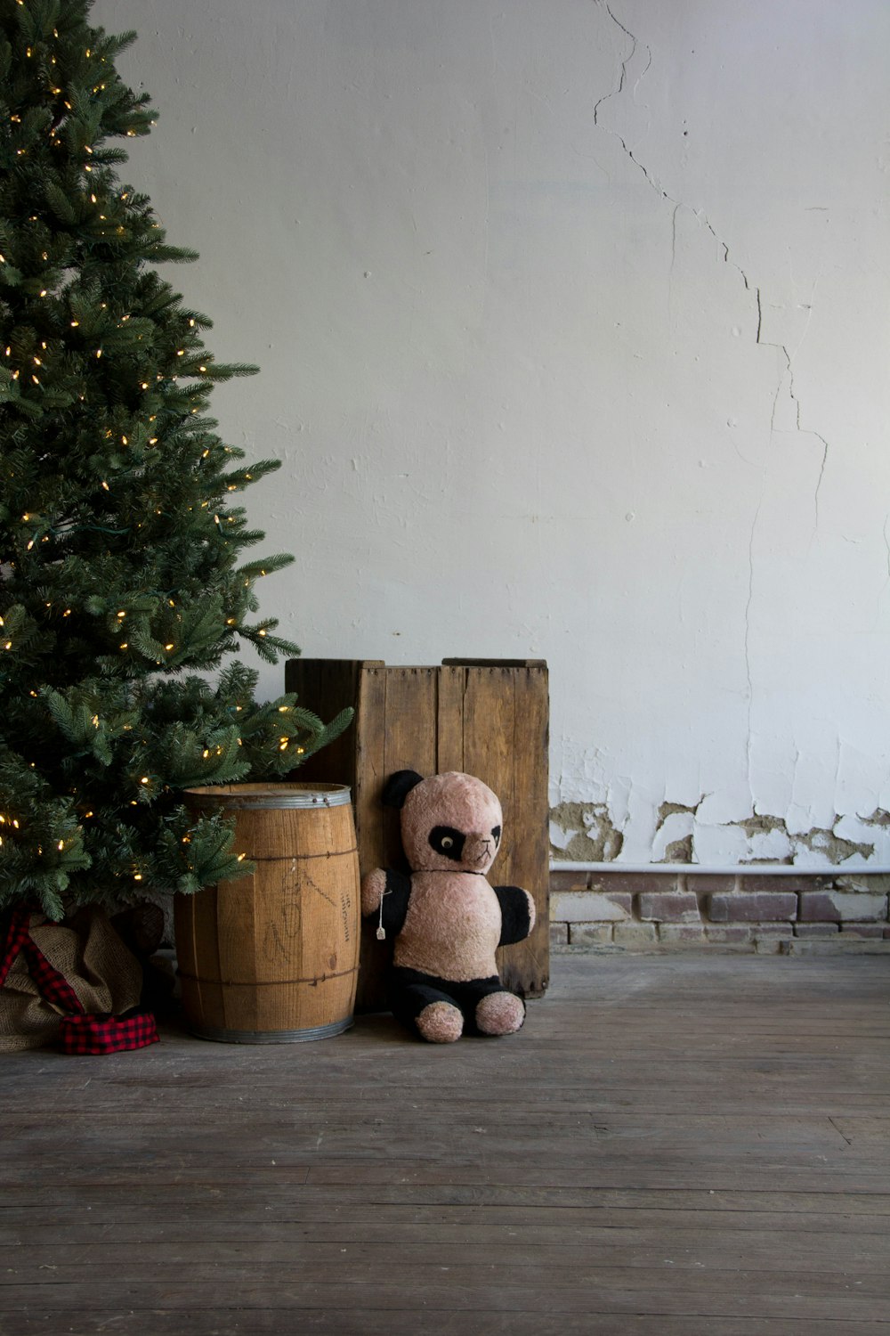 brown bear plush toy on brown wooden table