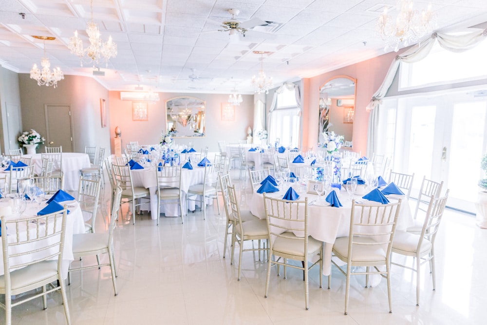 white and blue chairs and tables