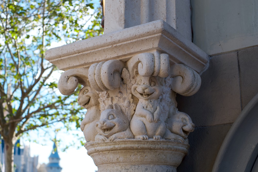 a close up of a decorative column on a building