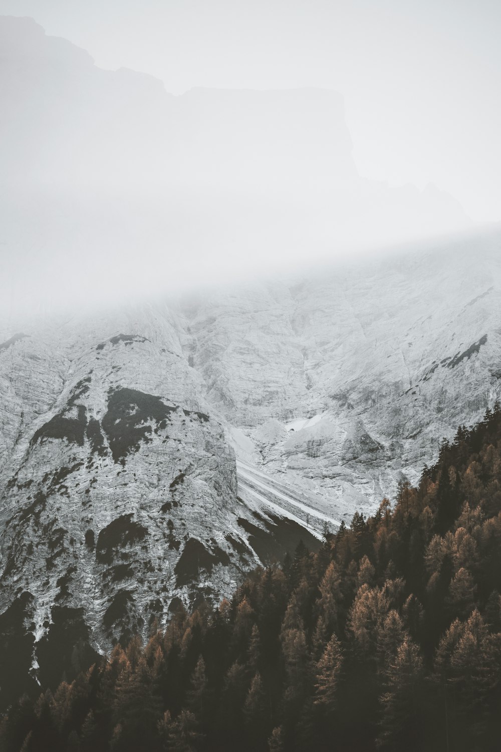 snow covered mountain during daytime