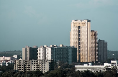 white and brown high rise building