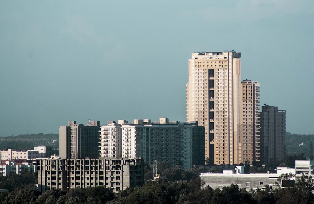 white and brown high rise building