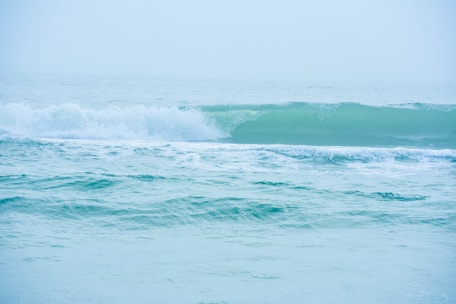 A calming guided soundscape scene with gentle waves and soft colors.