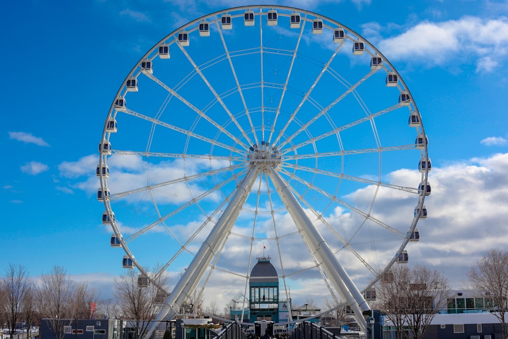 white and blue ferris wheel