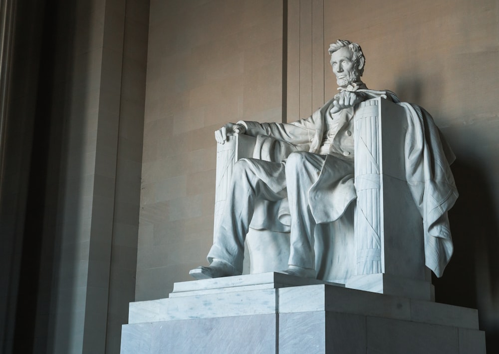 man in white robe statue