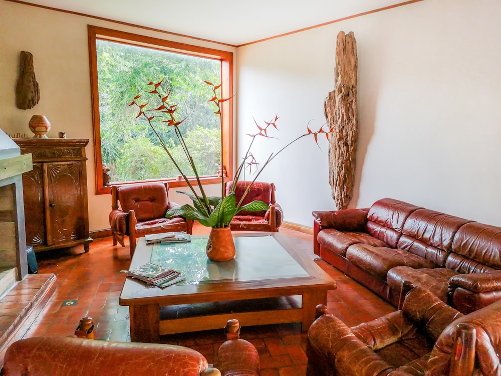 a living room filled with furniture and a fire place