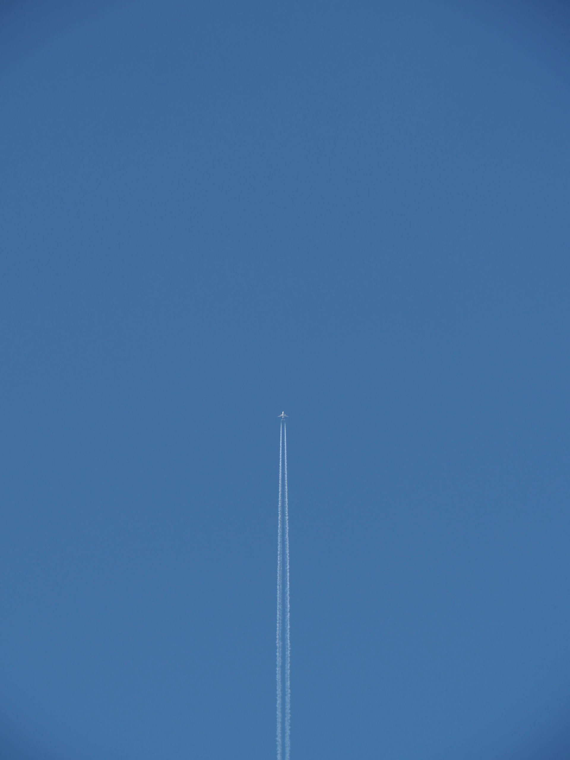 white light post under blue sky during daytime