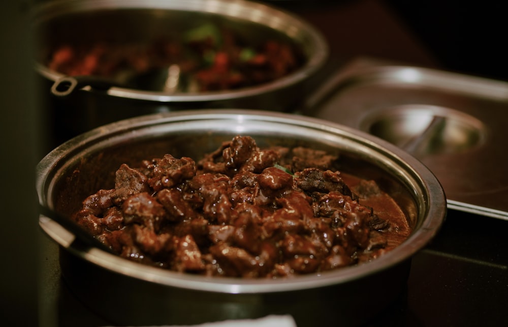 brown food in stainless steel bowl