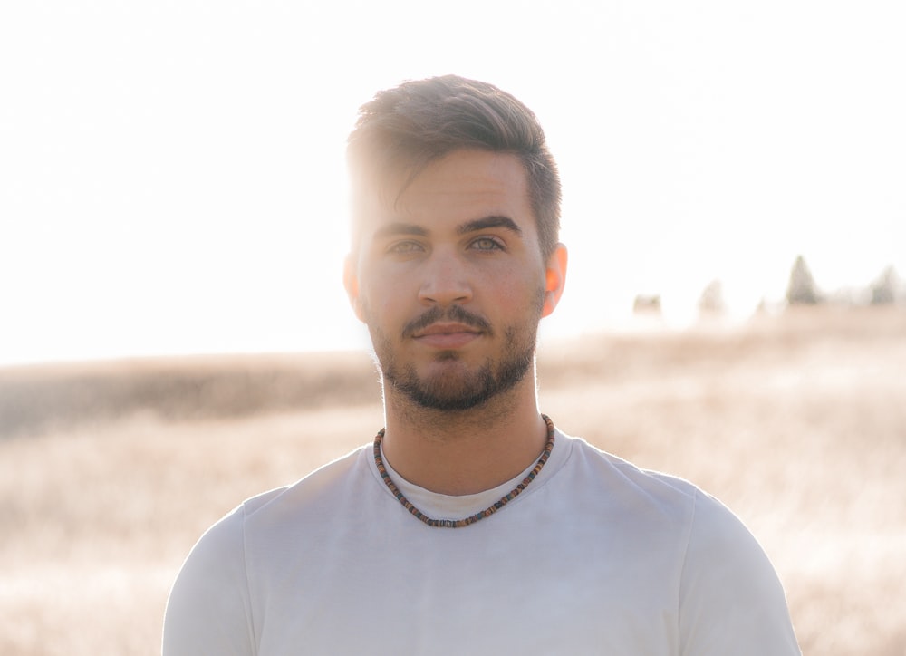 man in white crew neck shirt