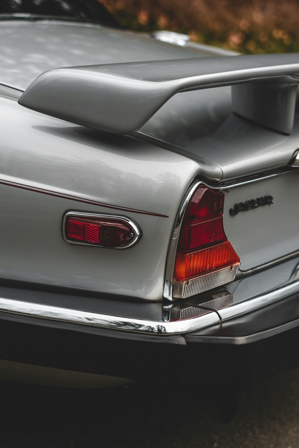 silver car with red and white license plate