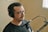 man in black crew neck shirt wearing black headphones