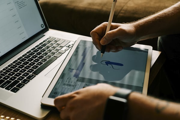 Learner studying data and code on a laptop