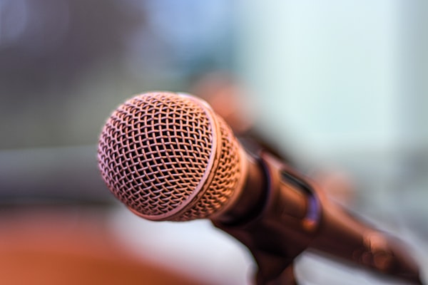 Vintage microphone on a wooden stand
