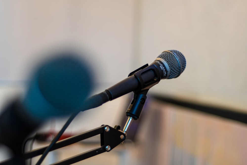 black microphone on black microphone stand