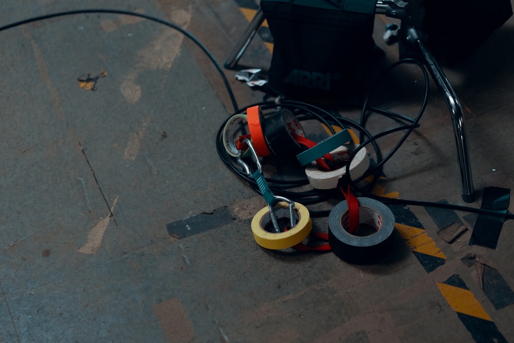 black red and yellow corded headphones