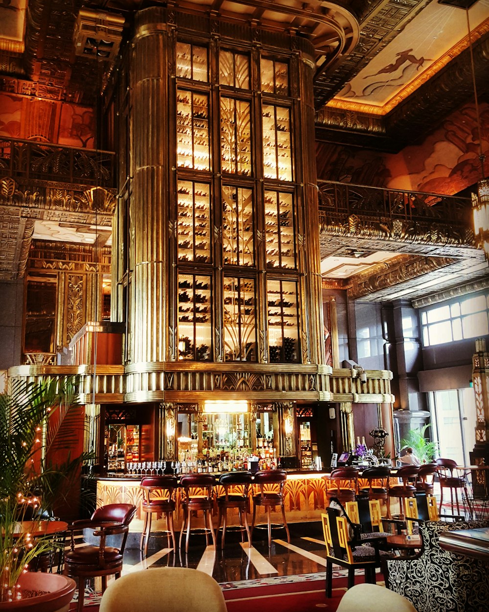 brown wooden table and chairs inside restaurant