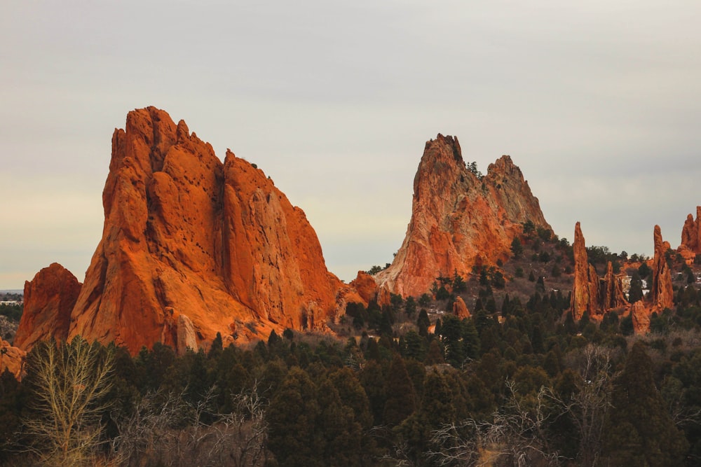 brown rock formation under white sky during daytime