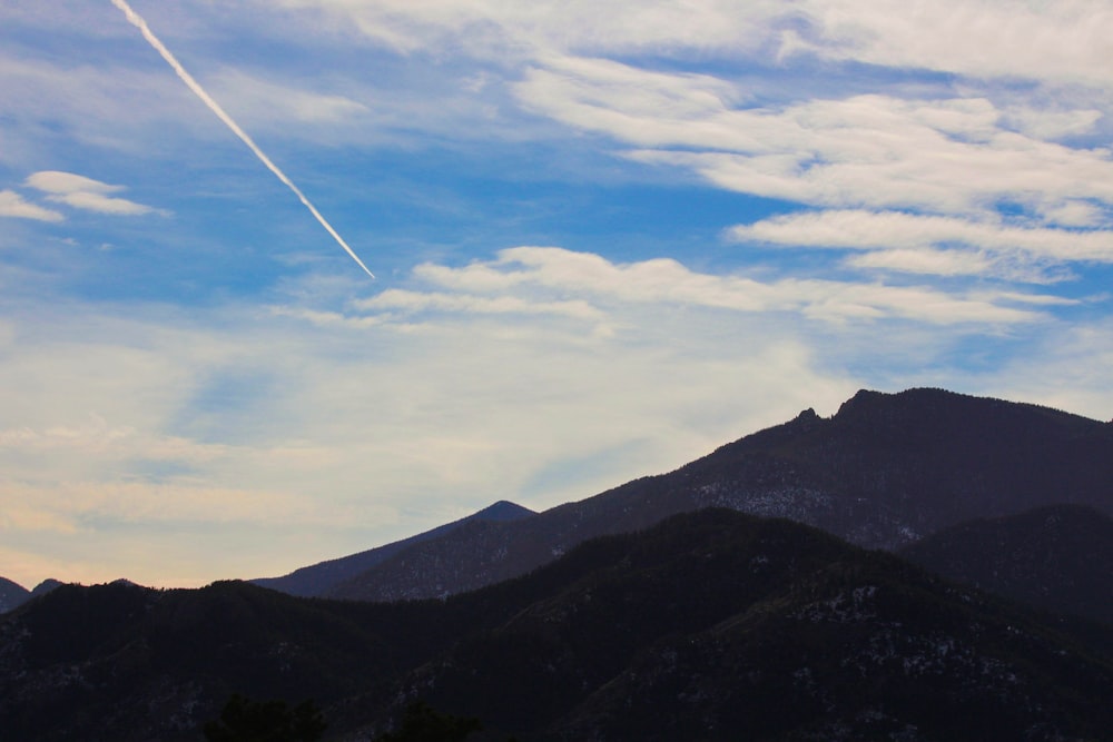 brown mountains under blue sky during daytime