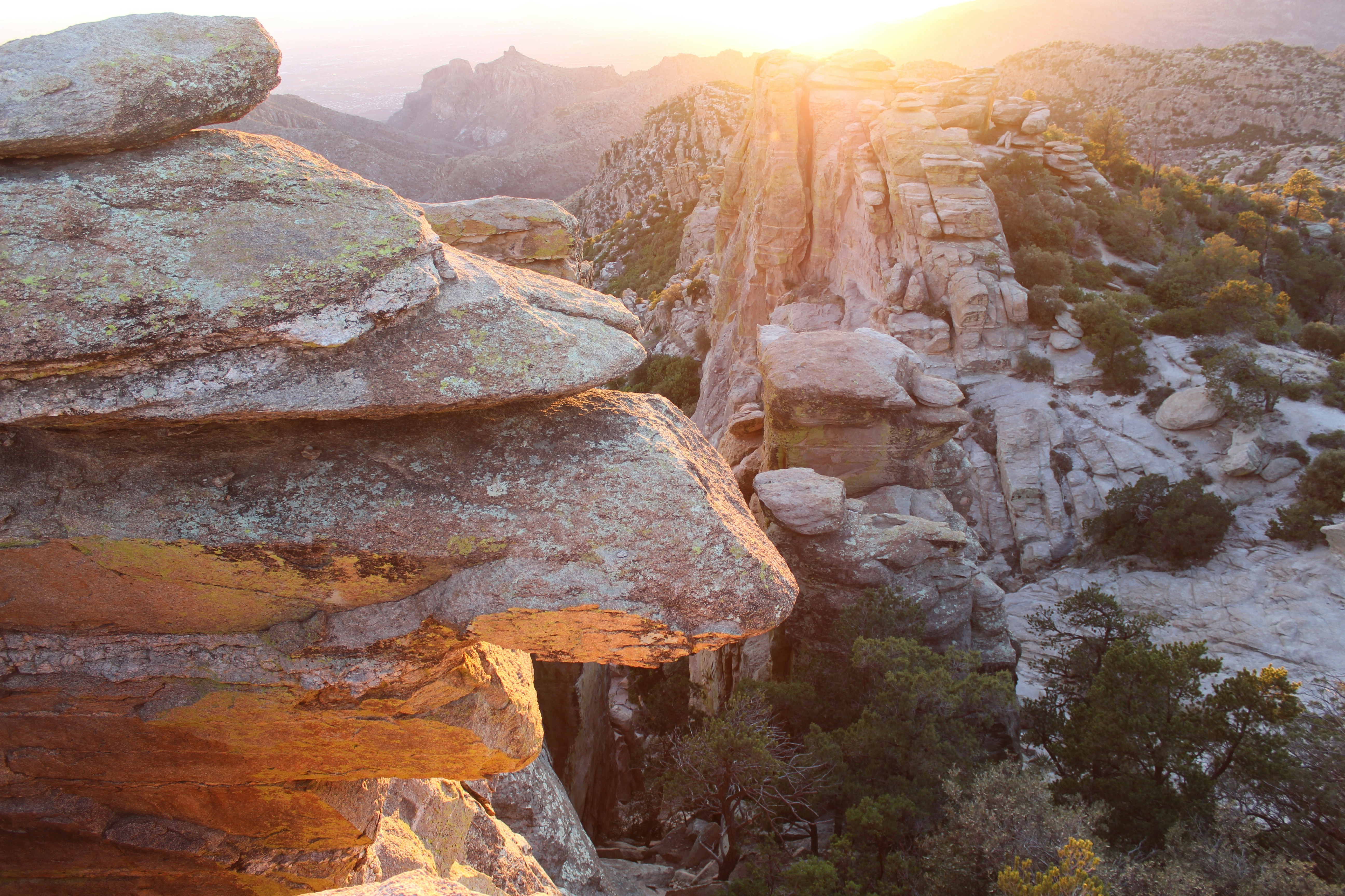 brown rocky mountain during sunset