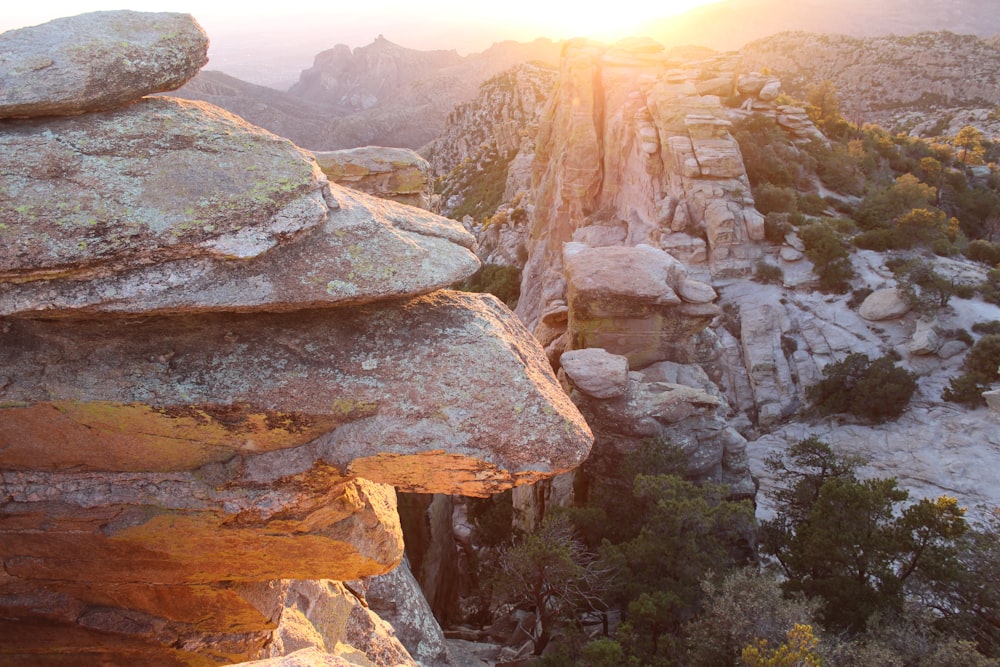 brown rocky mountain during sunset