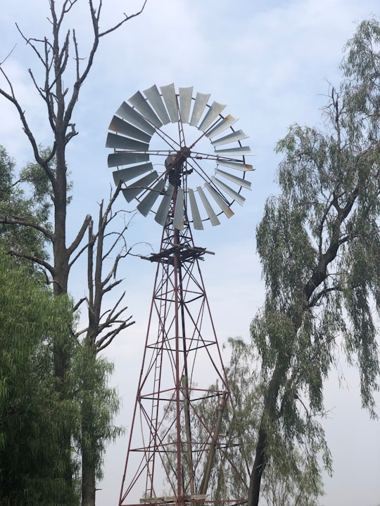 black and white windmill under blue sky during daytime in Moree NSW 2400 Australia