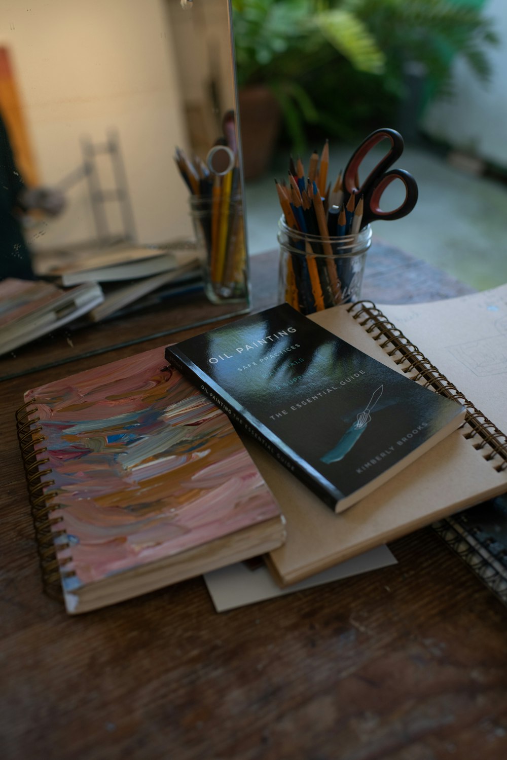 black book on brown wooden table