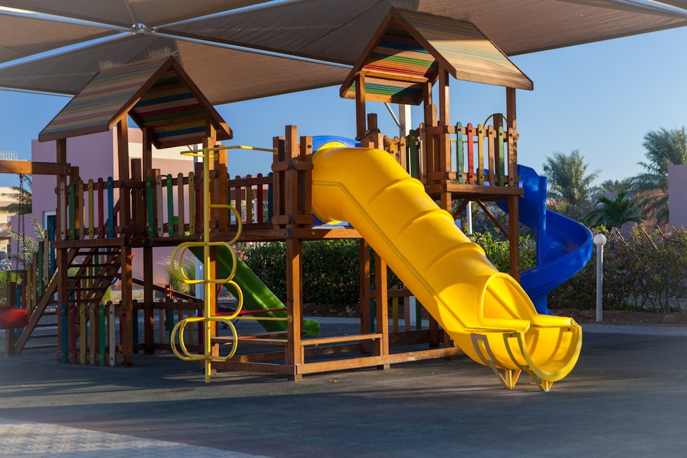 yellow and brown playground slide