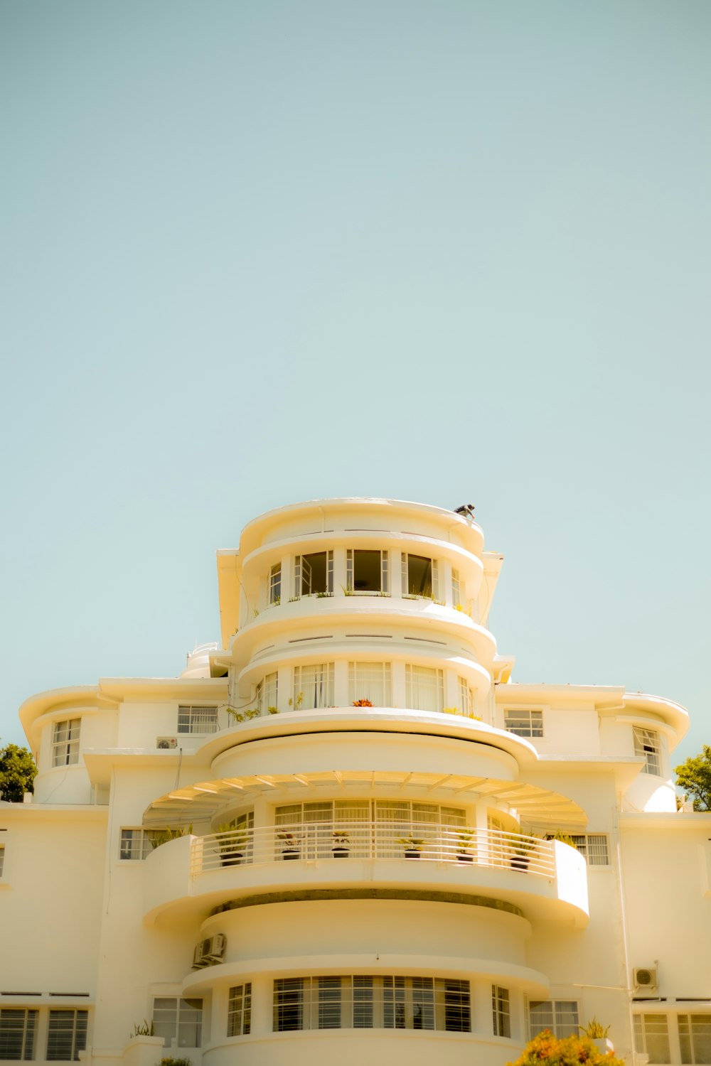 white concrete building under blue sky during daytime