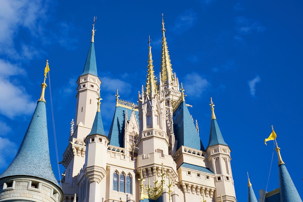 white and blue concrete castle under blue sky during daytime