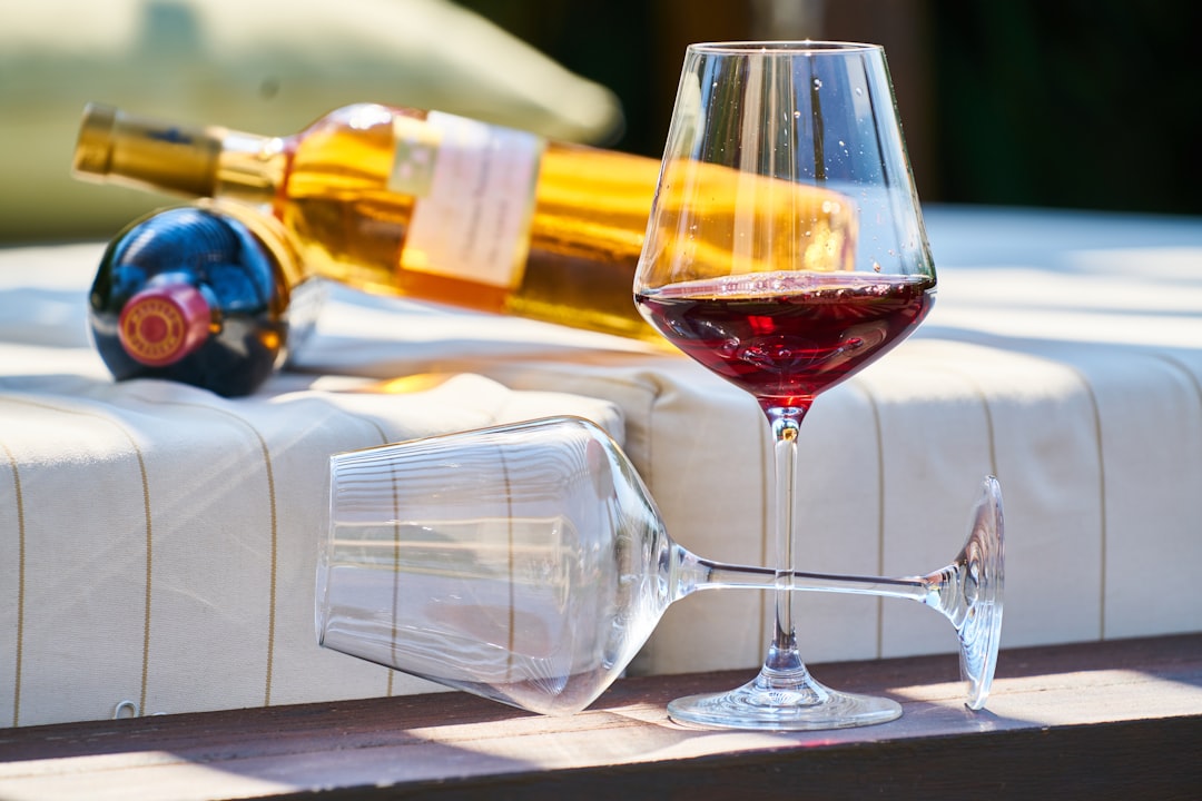 clear wine glass with red wine