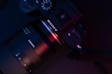 black nikon dslr camera lens