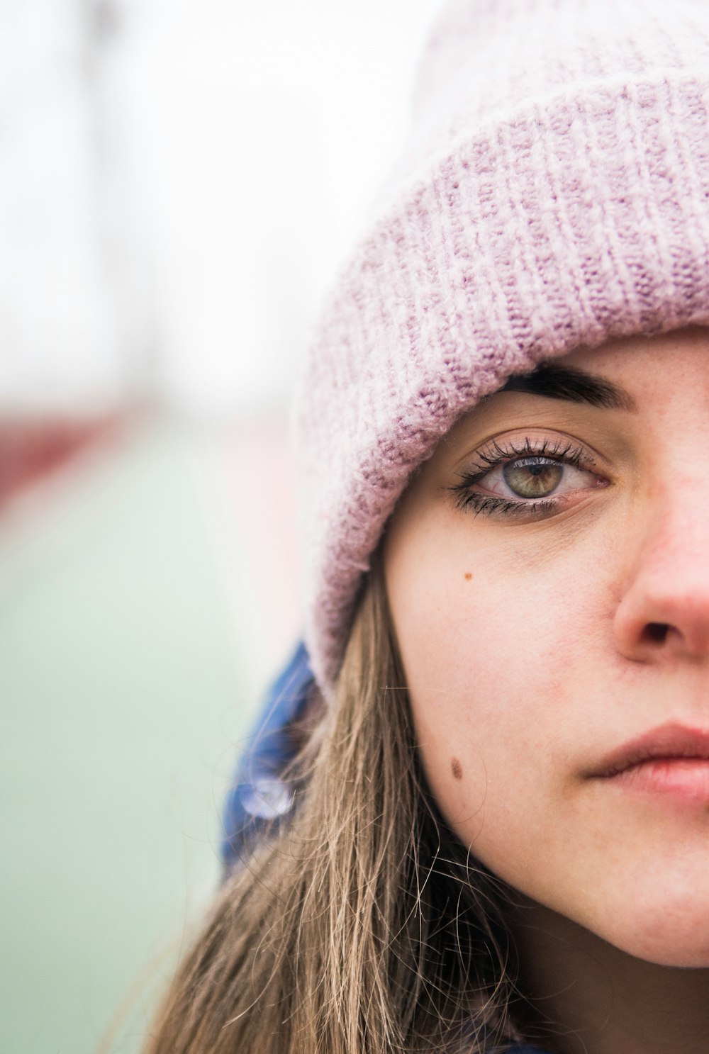 woman in gray knit cap