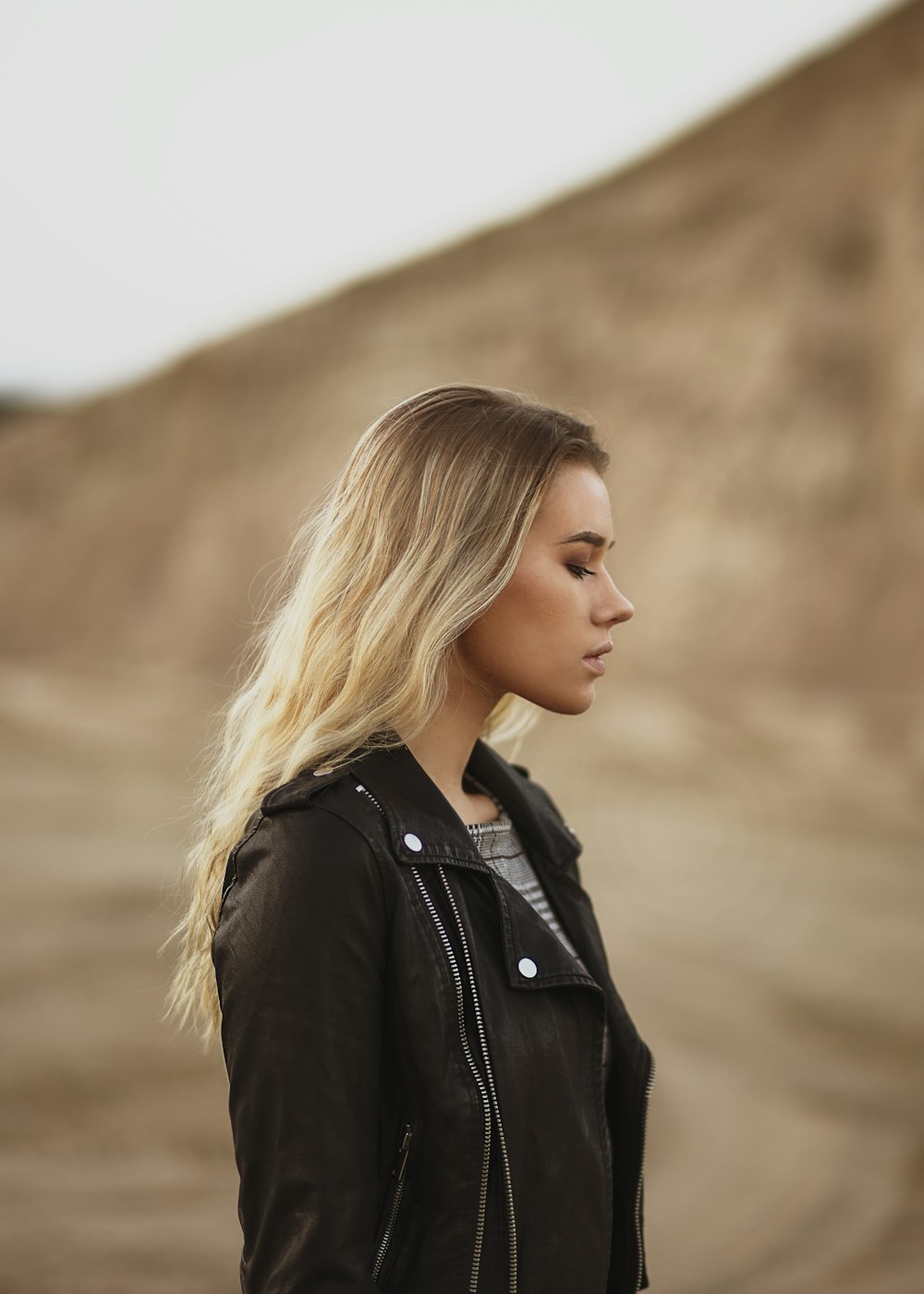 woman in black leather jacket