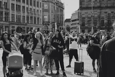 A snapshot of a vibrant public space with people engaging in everyday acts of kindness.