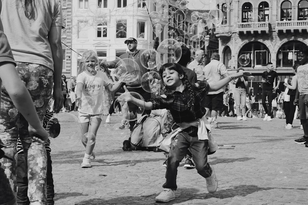 grayscale photo of people on street