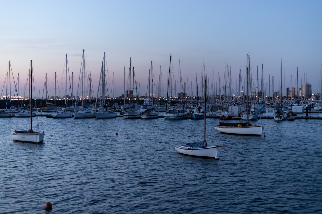 white sail boats on sea during daytime