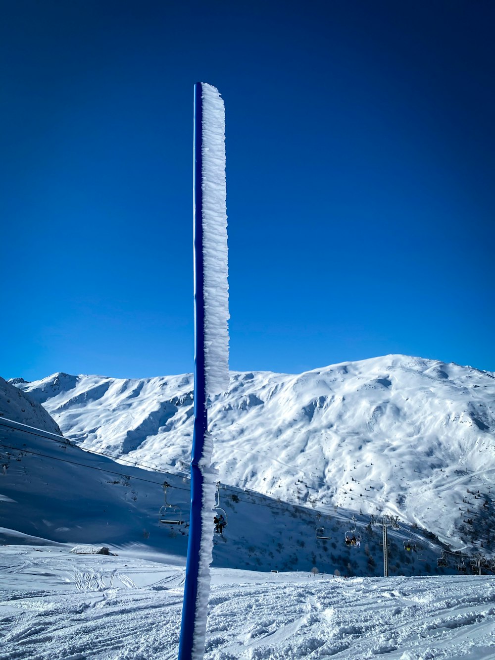 snow covered mountain under blue sky during daytime