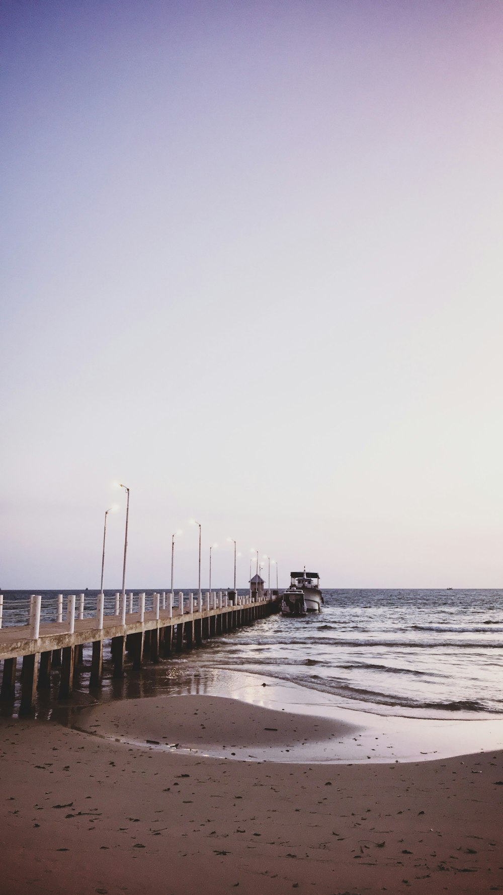 people walking on wooden dock during daytime