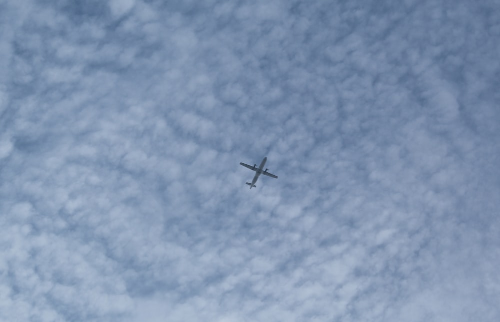 white airplane in mid air