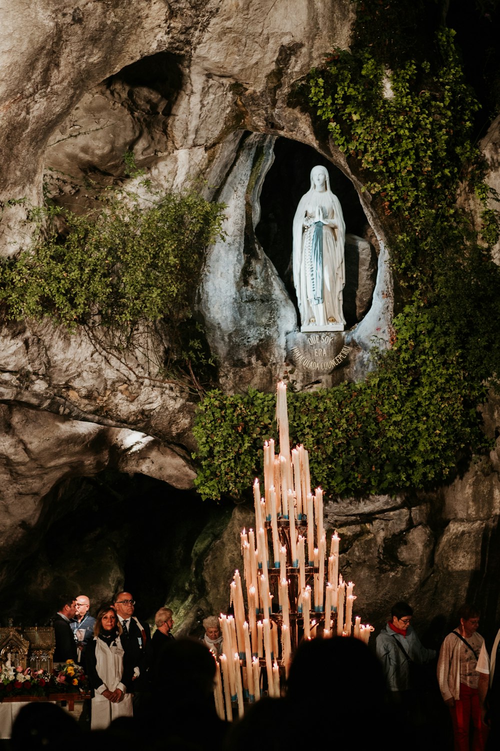 white angel statue on brown rock