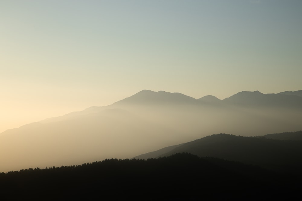 silhouette of mountain during sunset