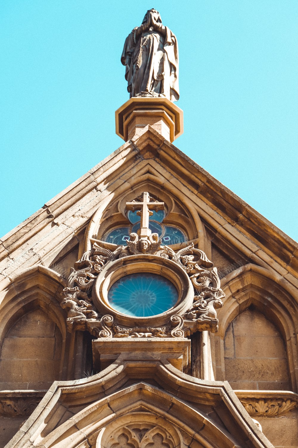 brown concrete building under blue sky during daytime