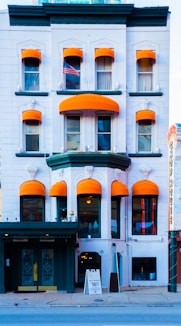 orange and green concrete building