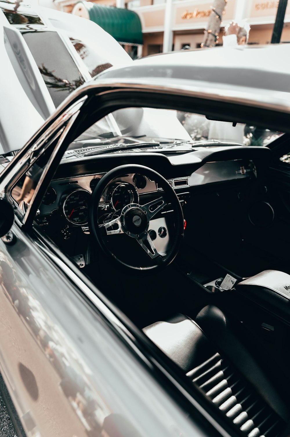 black and silver steering wheel