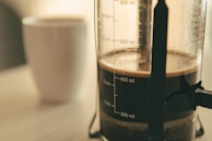 Close-up of ground coffee ready to be brewed in a French press.