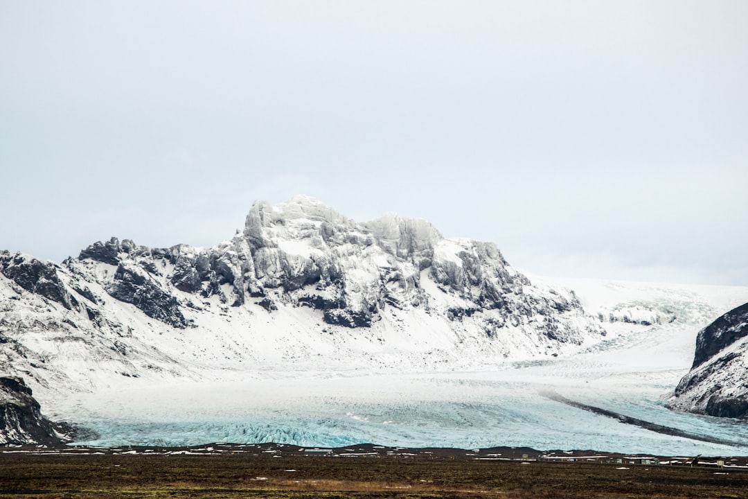 snow covered mountain during daytime