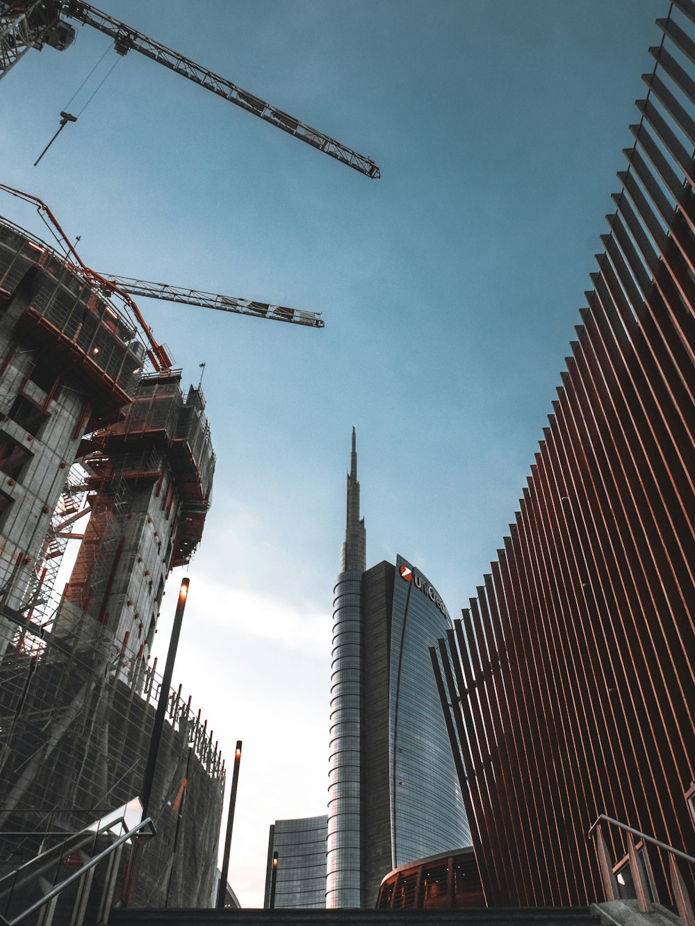 low angle photography of brown concrete building during daytime