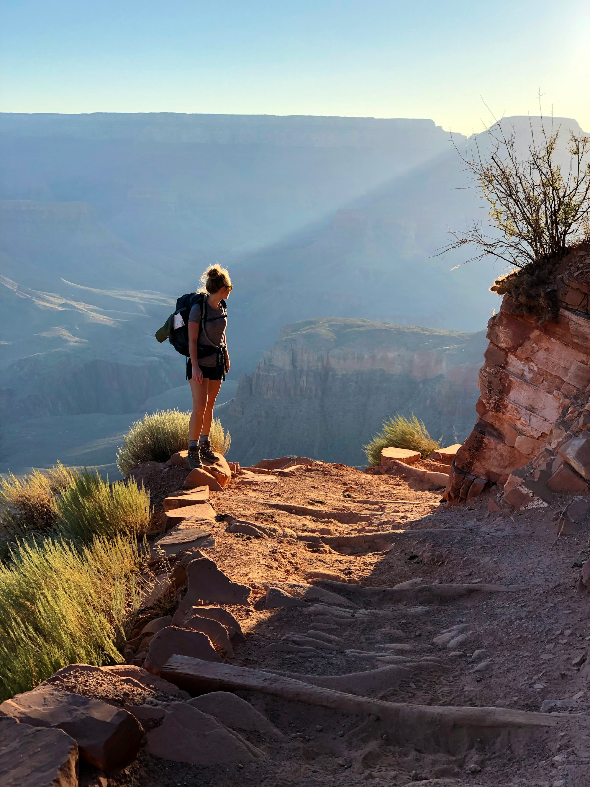 Girl hiking along a trail in the Grand Canyon, Arizona.