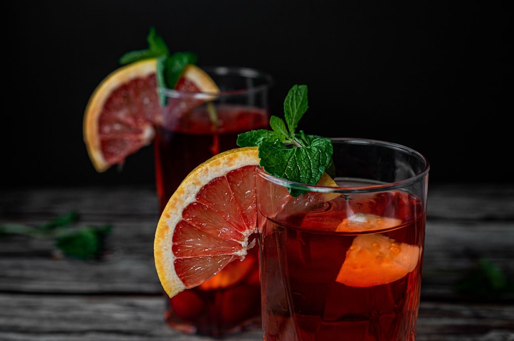 clear drinking glass with orange juice